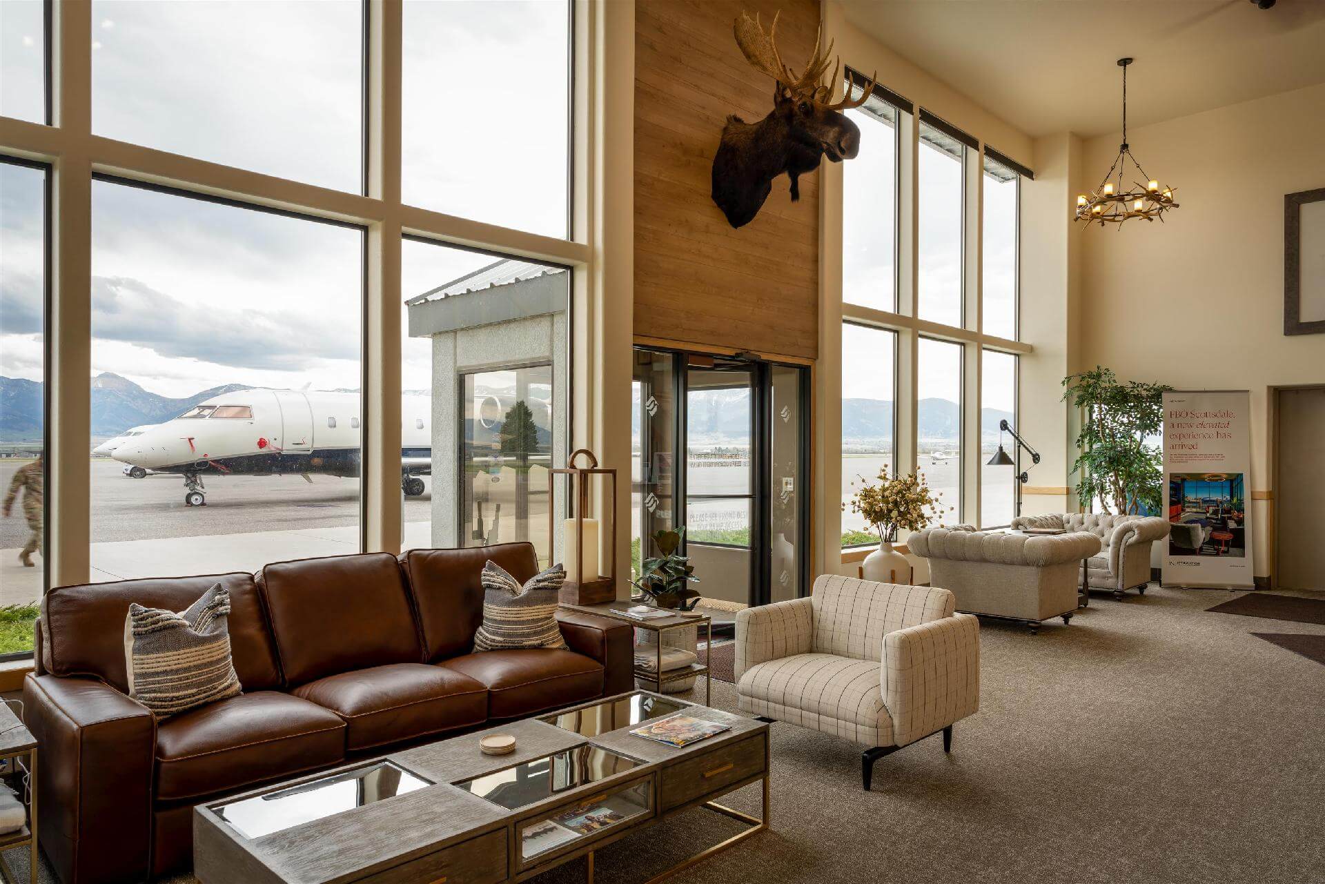 Lobby with view on the plane on the airport