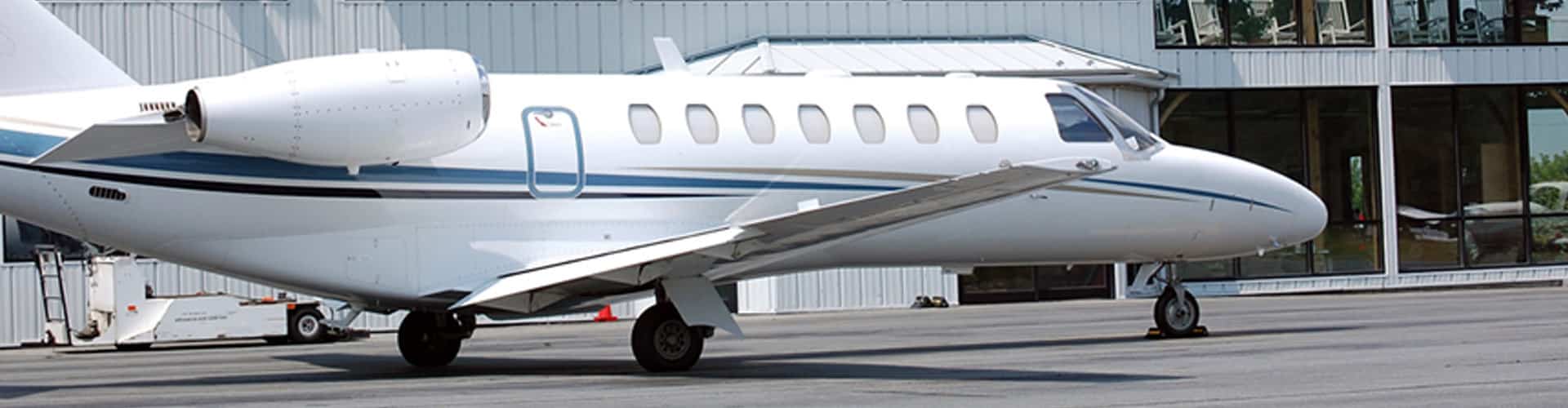 Aeroplane on the runway near to the building