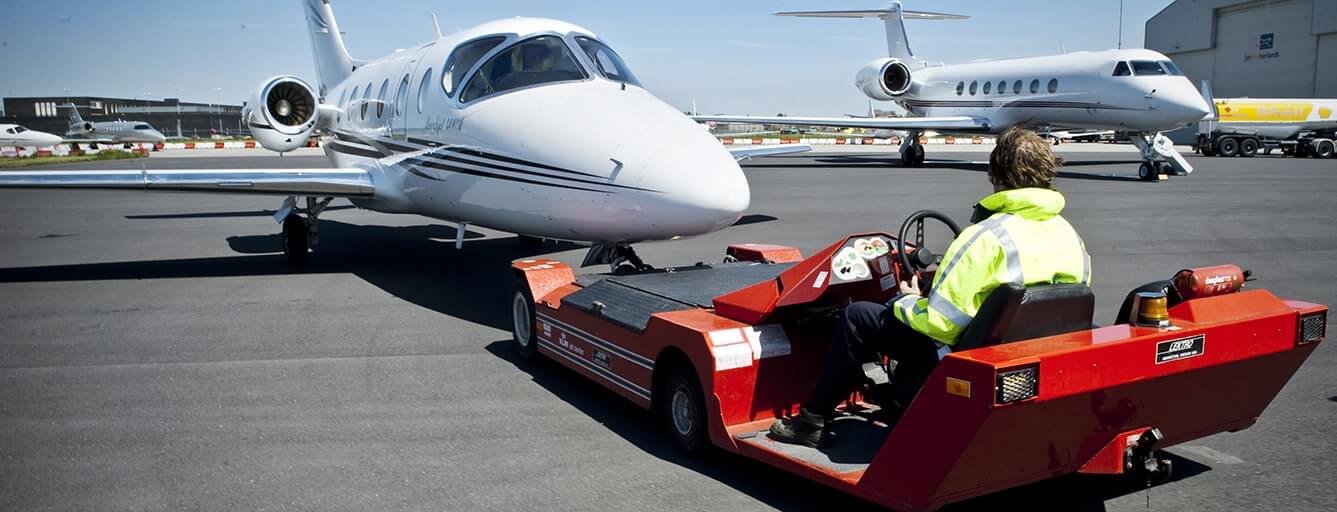 Man towing a plane