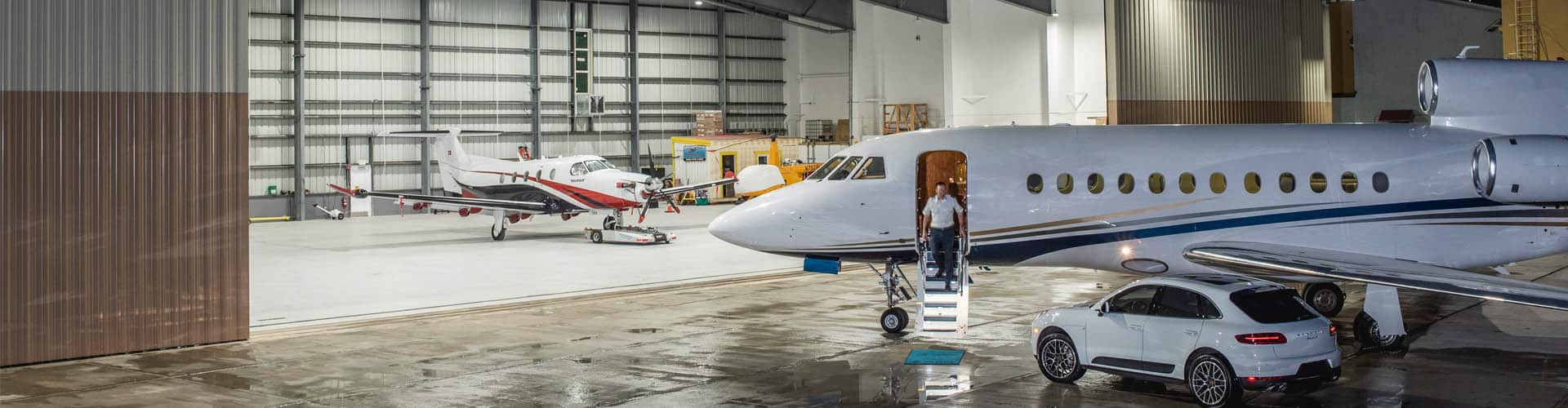 Pilot getting of from the plane to car