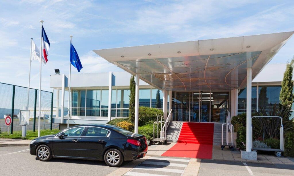 Car in front of the aircraft hall