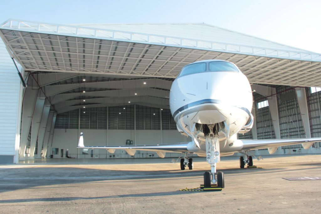 Aircraft in front of the hangar