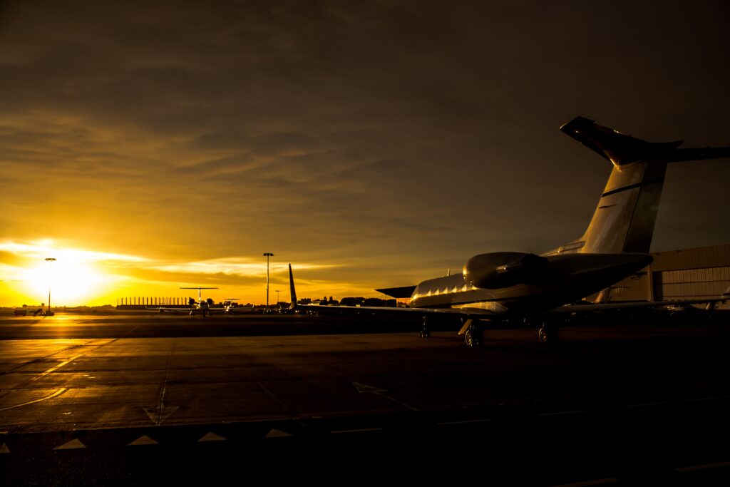 Plane on the airport during sunset
