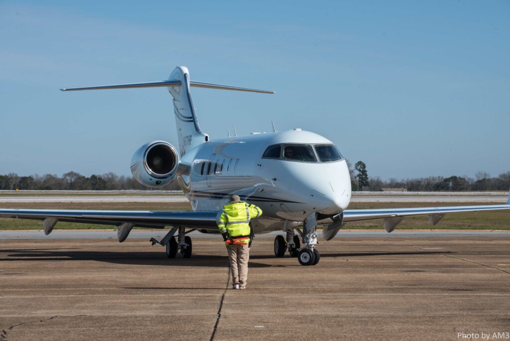 Air traffic controller supporting pilot in plane