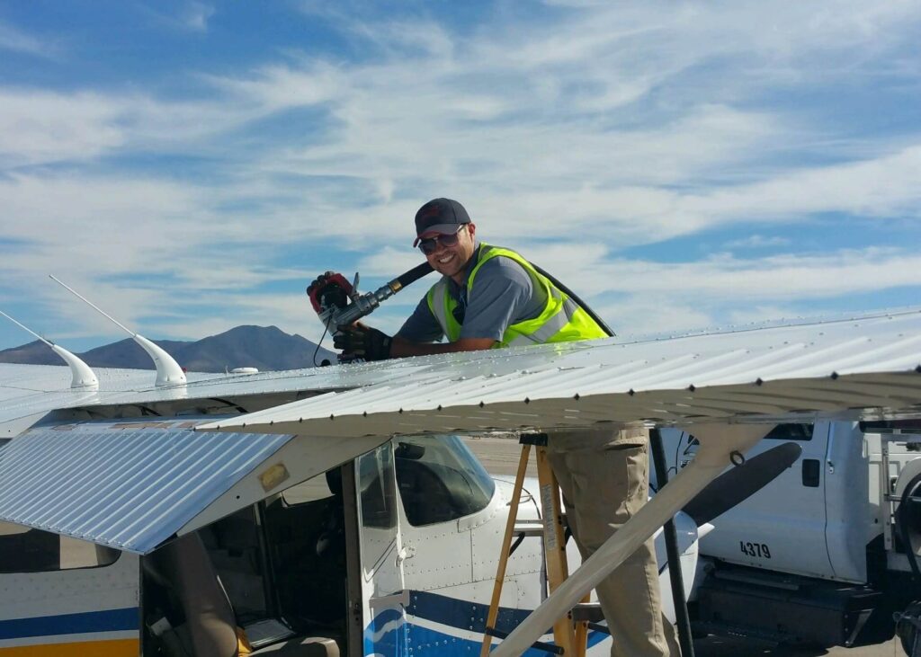 Man fueling the aeroplane