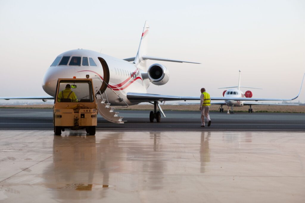 Plane and car in hangar