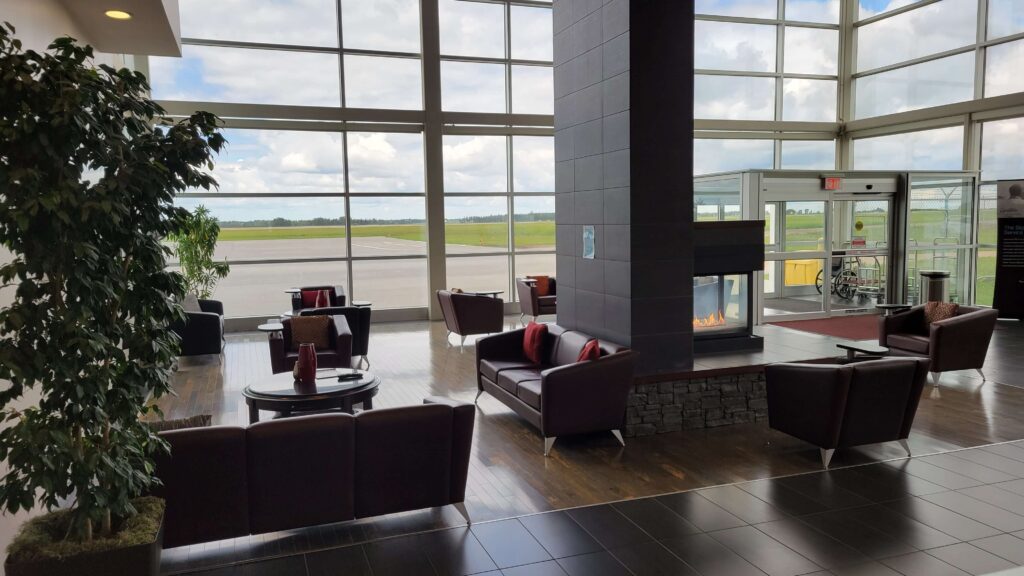 Terminal hall with aircraft view