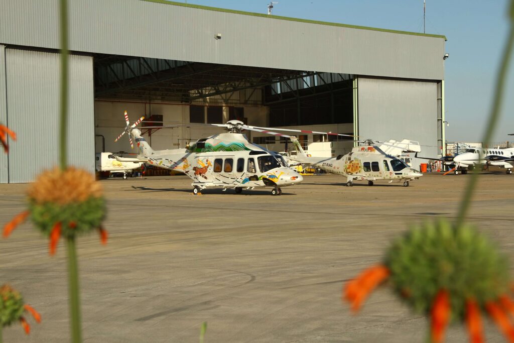 Two helicopters and hangar