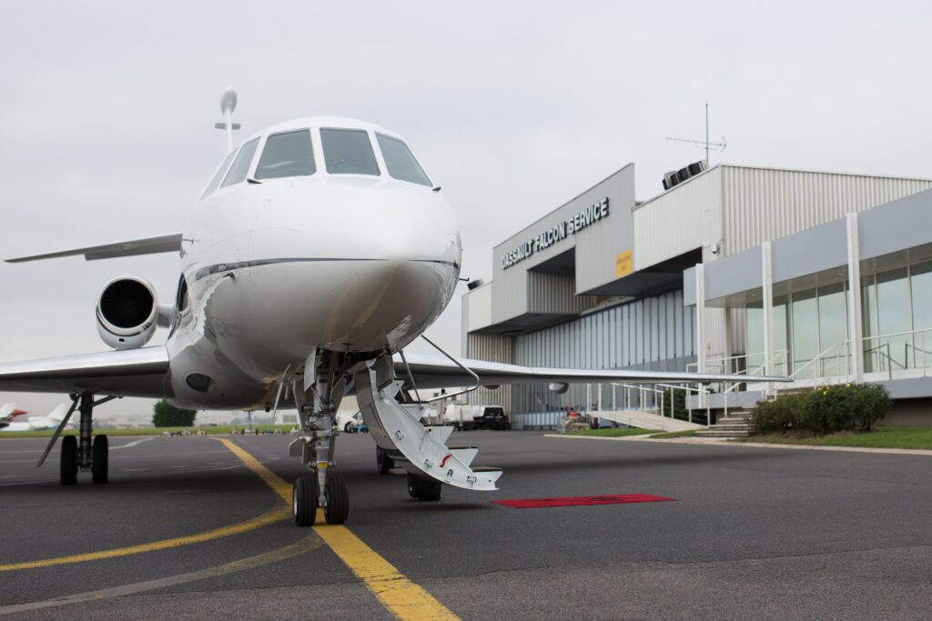 Plane waiting for the crew at the hangar