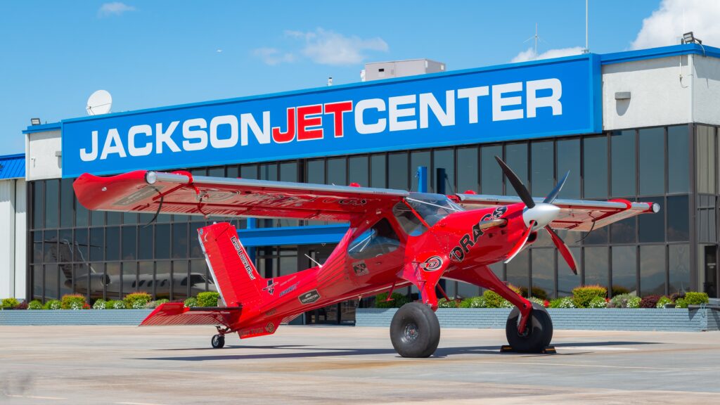 Red plane on ramp