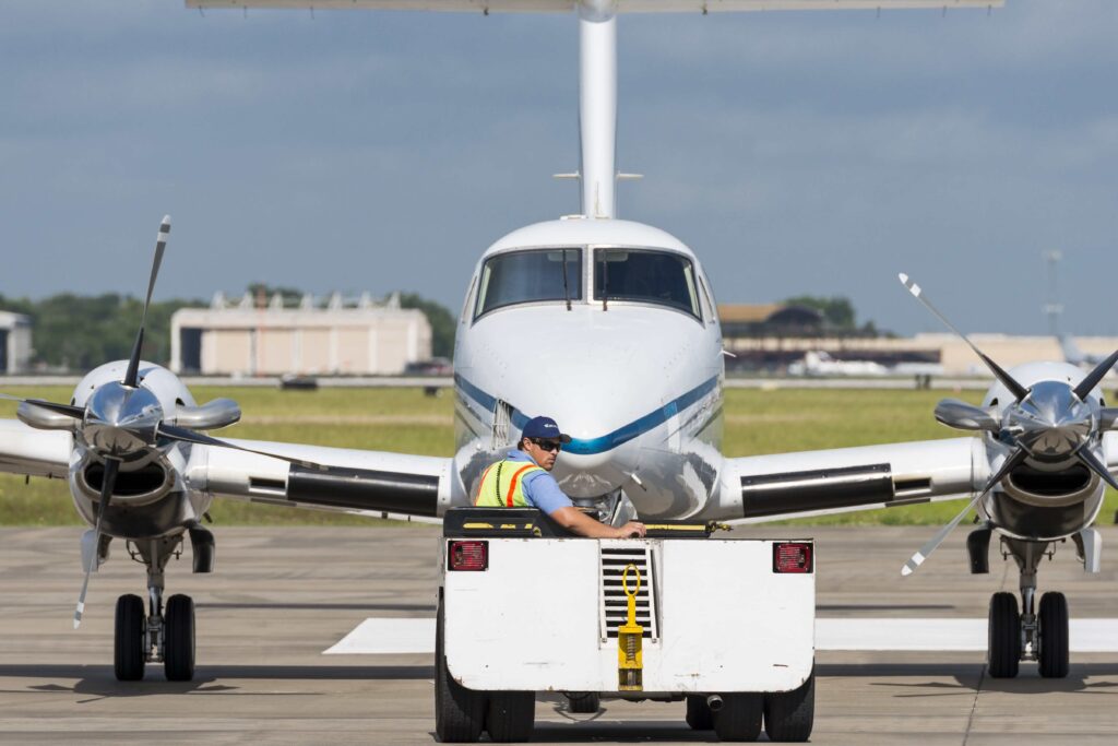 Man towing a plane