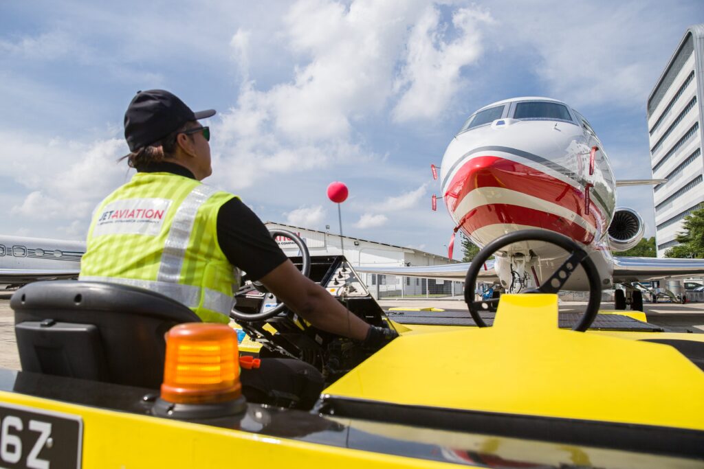 Man towing a plane