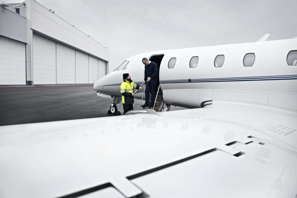 Man disembark from the aeroplane