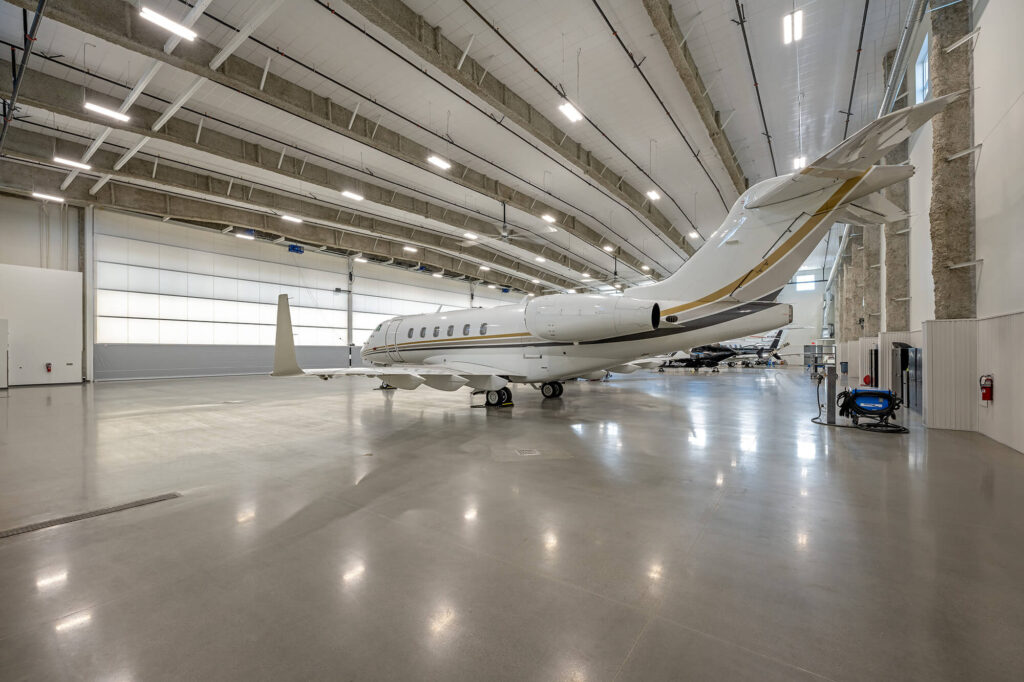 White plane in hangar