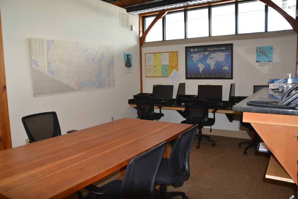 Office room with map and computers