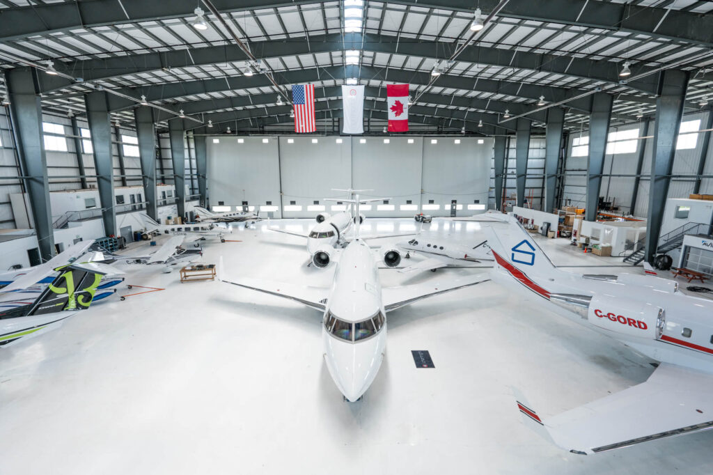 White planes in the hangar