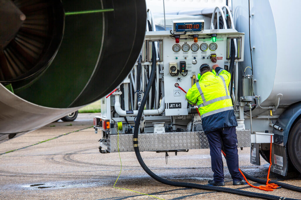 A man refuels the plane