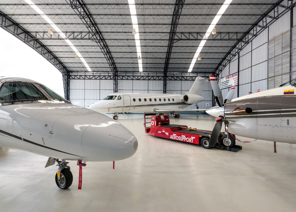Jets shown parked in a hangar